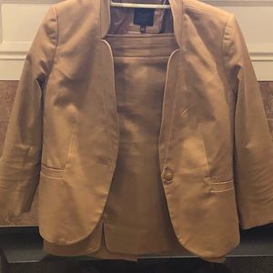 Two piece tan skirt suit